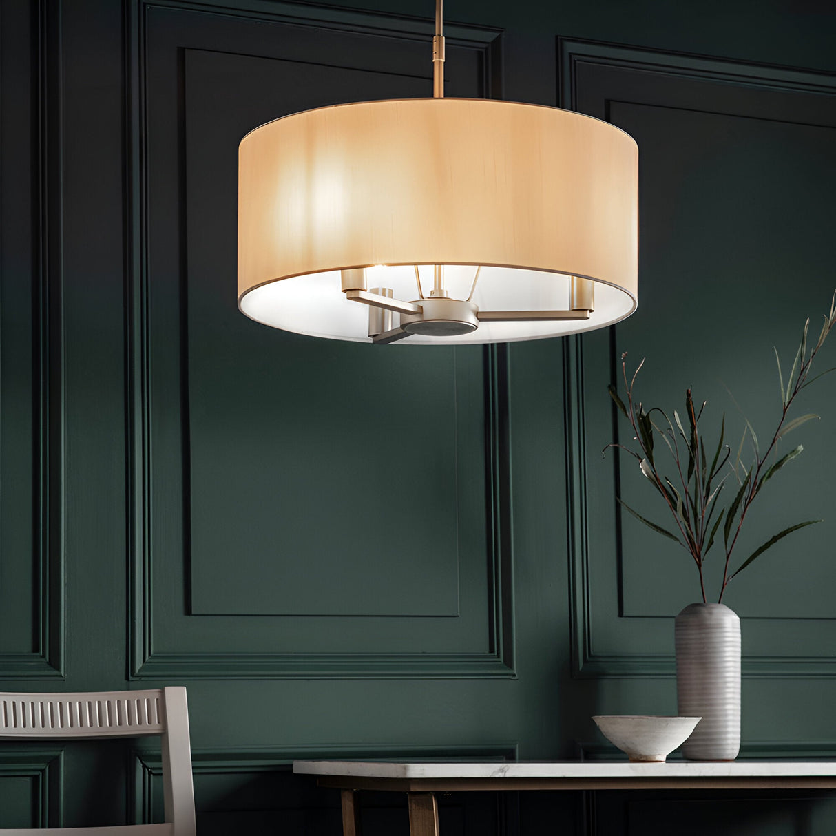 Endon Bexley large 3-light pendant with vintage white faux silk drum shade and brushed nickel frame, hanging in a dark green panelled dining room.