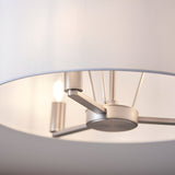 Close-up of Endon Bexley Large 3 Light Pendant interior showing brushed nickel three-arm frame with E14 lamps beneath a white faux silk shade.