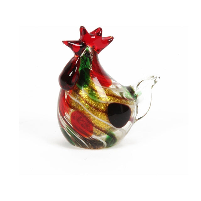 Cockerel glass figurine with red comb and wattle, body swirled in red, green and white glass with gold glitter banding, clear glass tail, on a plain white background.
