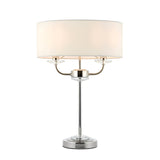 Endon Castdon 2 light table lamp with nickel frame, crystal glass detailing and white drum shade on a plain background.