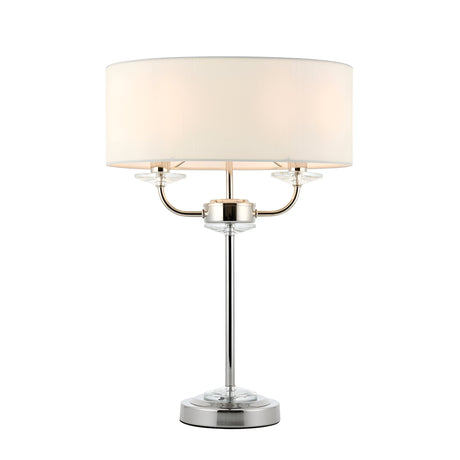 Endon Castdon 2 light table lamp with nickel frame, crystal glass detailing and white drum shade on a plain background.