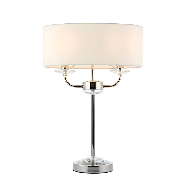 Endon Castdon 2 light table lamp with nickel frame, crystal glass detailing and white drum shade on a plain background.