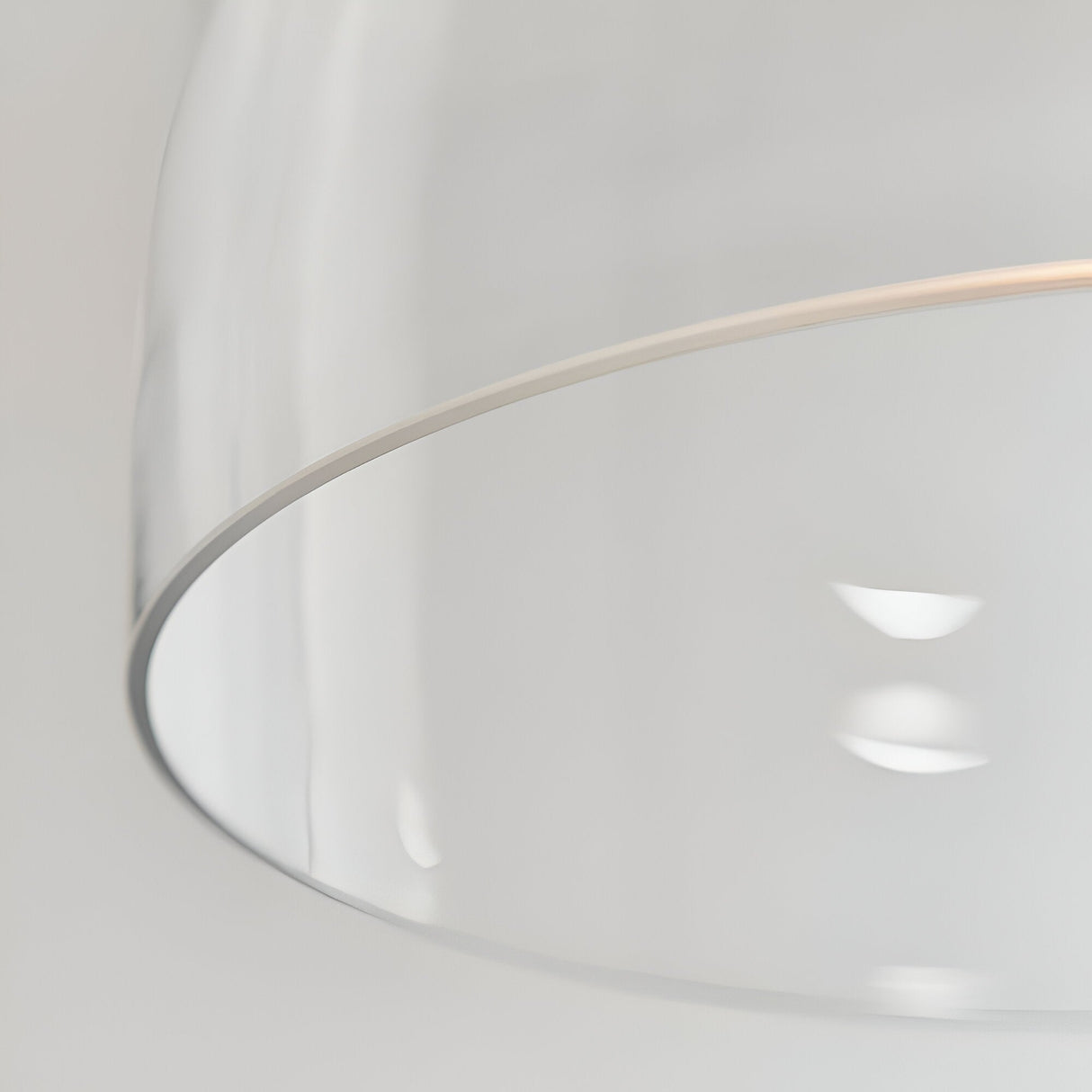 Close-up of the Endon Brackmere pendant light showing the clear glass shade rim against a plain light background.
