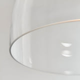 Close-up of the Endon Brackmere pendant light showing the clear glass shade rim against a plain light background.