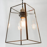 Endon Aldwell pendant light with angular clear glass panels, antique brass trim, and a single E27 filament bulb, shown against a plain light background.