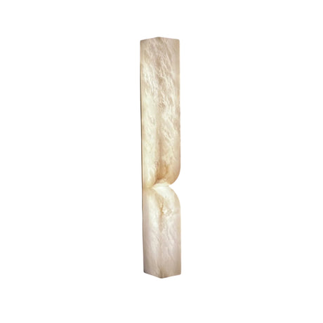 The Vera LED Large Silhouette Alabaster Wall Light – Soft White is a tall, narrow rectangular fixture with a smooth, subtly textured cream surface and a curved indentation near the lower middle, displayed against a white background.