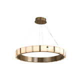 The Strata LED Small Alabaster Chandelier in soft white and copper hangs from four slim wires, featuring frosted alabaster panels around its circular edge for a stylish, elegant look reminiscent of a modern chandelier.