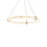 The Aureon LED Small Alabaster Circular Suspension Light – Soft White features a modern, minimalist design with a glowing Spanish alabaster ring, brass accents, and is suspended by three thin wires against a white background.