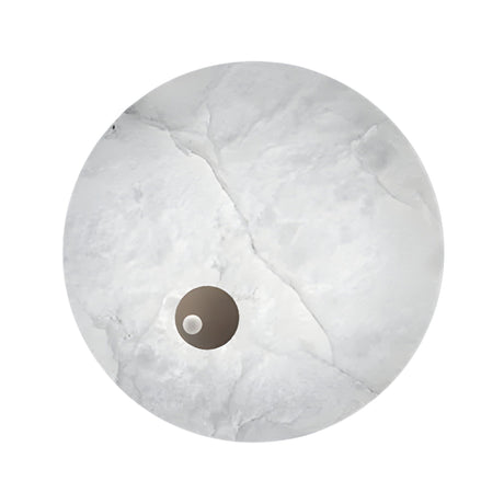 The Selvana LED Large Alabaster Wall Light in soft white features a round, marble-textured surface with two circular openings—one larger, one smaller—near the bottom left, echoing the look of Spanish alabaster sconces.