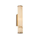 The Montavo LED Medium Tube Alabaster Wall Light in soft white and brushed brass features a cylindrical, marble-patterned Spanish alabaster glass shade and is shown mounted vertically against a white background.