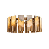 The Caelith LED Small Panel Alabaster Chandelier in brushed brass features vertical gold and marble panels, casting a warm glow from alabaster sections for a luxurious, elegant look against a white background.