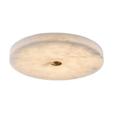 The Aleron LED Large Round Alabaster Flush Ceiling Light in soft white features a marble-like alabaster surface and a small brushed brass center accent, shown here against a white background.