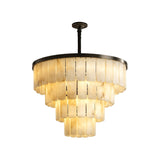 The Auravel 16 Light Medium Tiered Alabaster Chandelier features layered alabaster panels and a matte black frame, suspended from the ceiling in soft white for a warmly illuminated look.