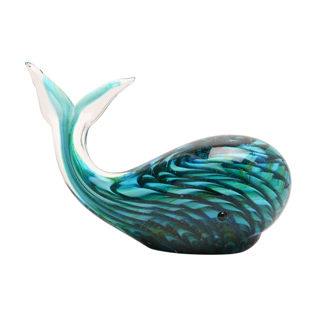 Glass whale figurine with swirled green, turquoise, and navy body and a raised clear-tipped tail, set on a plain white background.