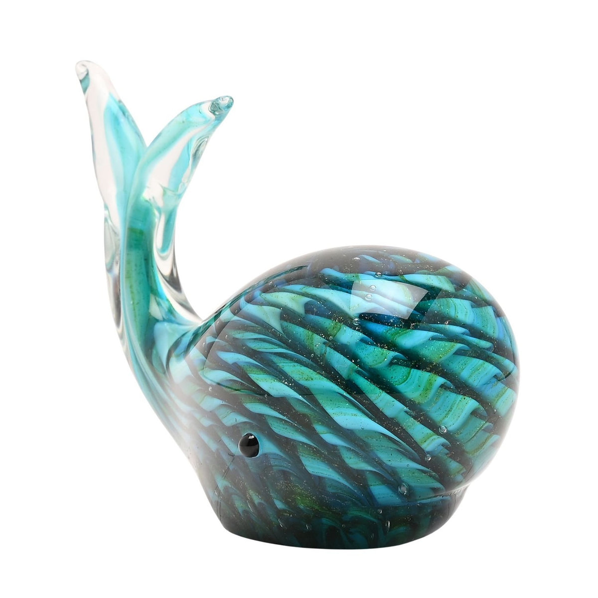 Glass whale figurine with rounded green body swirled in turquoise and navy, clear raised tail, and a glossy finish on a plain white background.