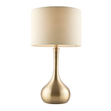 Endon Chartbury LED table lamp with a brushed brass teardrop base and beige fabric drum shade, shown on a plain white background.