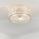Endon Ophelia 3 light flush bathroom ceiling light in chrome with crystal detailing and frosted glass diffuser, mounted to a white ceiling.