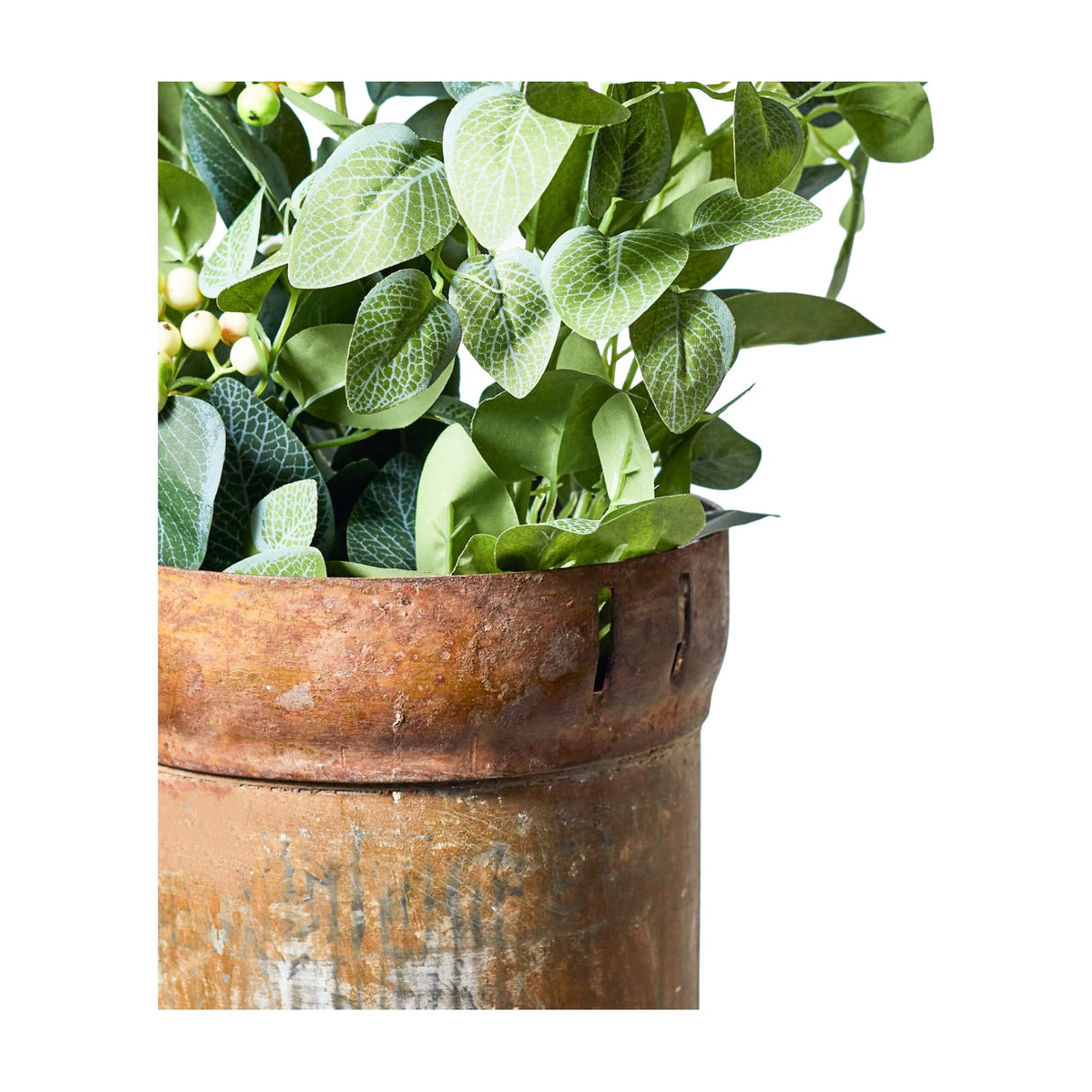 Libra Interiors Textured Trailing Fittonia faux stems with green veined leaves and pale berries, arranged in an aged rust-toned metal planter.