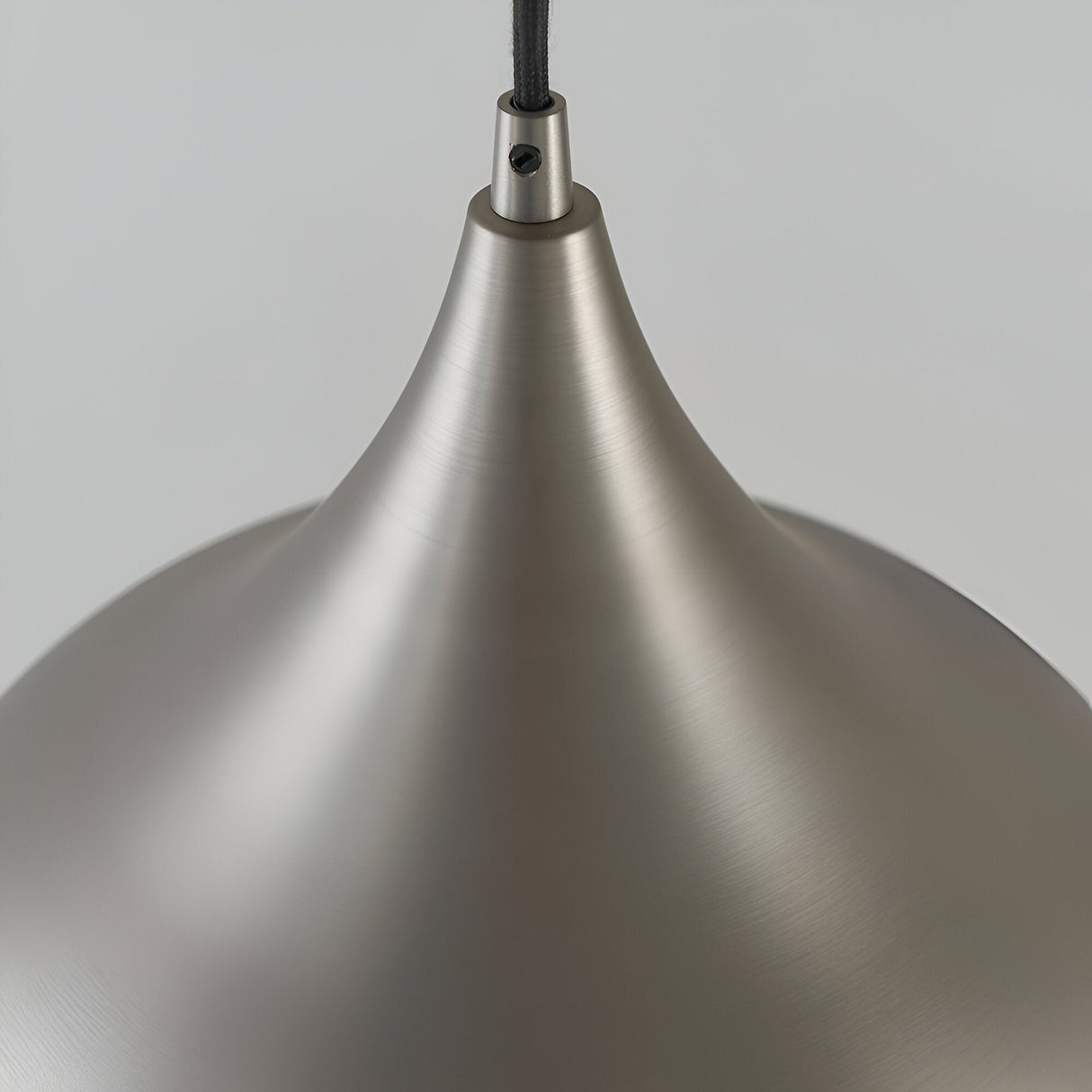 Close-up of the Ashleigh Pendant in matt nickel, showing the tapered dome shade and cable entry against a plain light grey background.