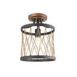 Endon Hulton flush ceiling light with black drum frame and gold wavy wire cage around a single E27 bulb, wood-effect ceiling plate, on white background.