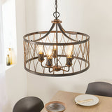 Hulton 5 Light Pendant in bronze and black with open lattice metalwork and five exposed bulbs, hung above a dining table on an adjustable chain.