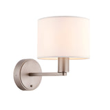 Bexley Wall Light in nickel, featuring a single-arm design with a round backplate and a white fabric drum shade, shown on a plain background.