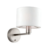 Bexley Wall Light in nickel with a white fabric drum shade, single arm bracket and round backplate, shown on a plain white background.