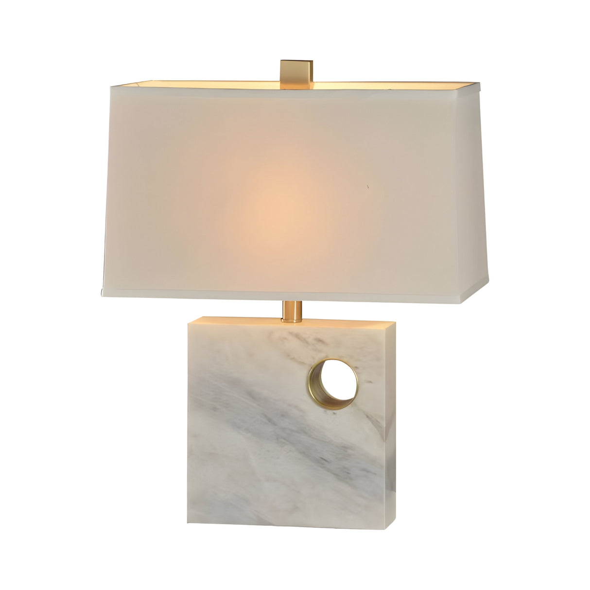 The Corvella 1 Light Pierced Marble Table Lamp in brass and white features a rectangular white shade, a marble base with a circular cutout, and brass accents, shown illuminated against a plain white background.