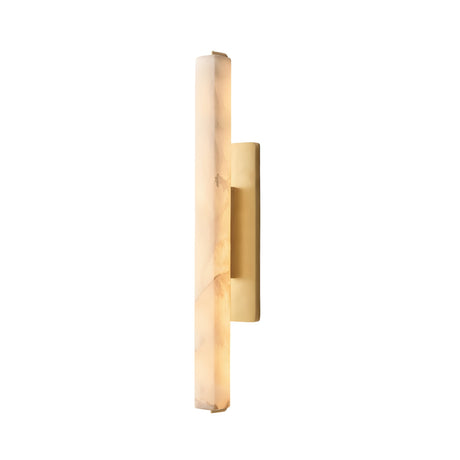 The Selvara LED Large Alabaster Wall Light in brushed brass features a vertical, elongated soft white shade and a gold backplate, casting a gentle, warm glow and bringing modern elegance to any plain white wall.