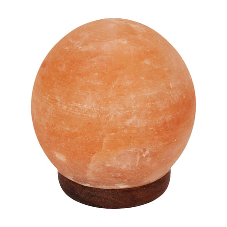 Sphere Himalayan rock salt lamp, 13.5cm, in peachy pink salt with pale veined texture on a round dark brown base, shown on a plain white background.