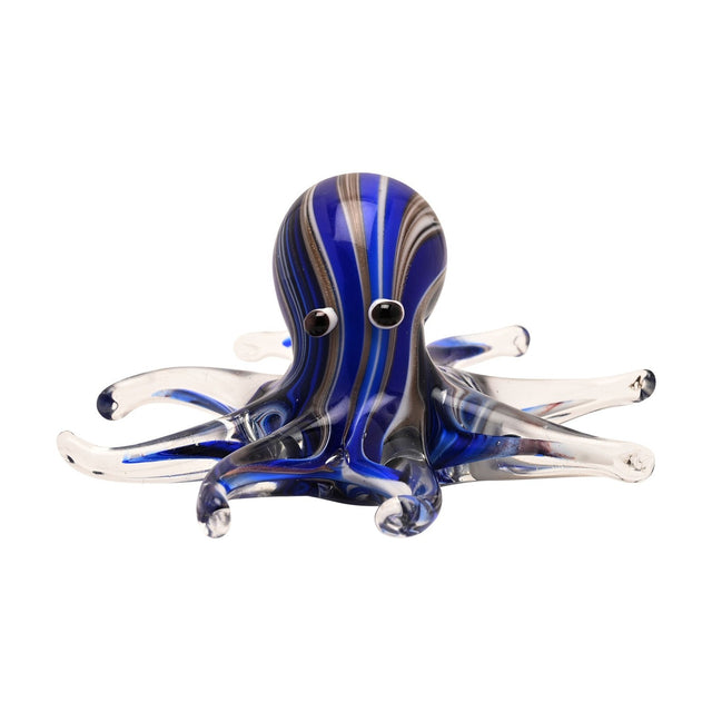 Swirl Octopus Glass Figurine with a deep blue, brown and white swirled head, black and white eyes, and spread tentacles fading to clear glass tips, shown on a plain white background.