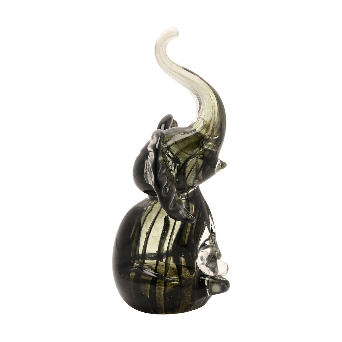 Trumpet Elephant Streaked Glass Figurine in black and grey, seated with trunk raised and ears spread, streaked body fading to clear glass at the trunk's tip, on a plain white background.