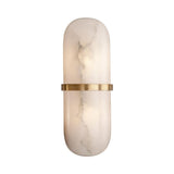 The Ciel LED Cylinder Alabaster Wall Light in soft white and brass features a modern design with an elongated frosted alabaster shade, marble-like veining, and a horizontal brushed brass band around its center.