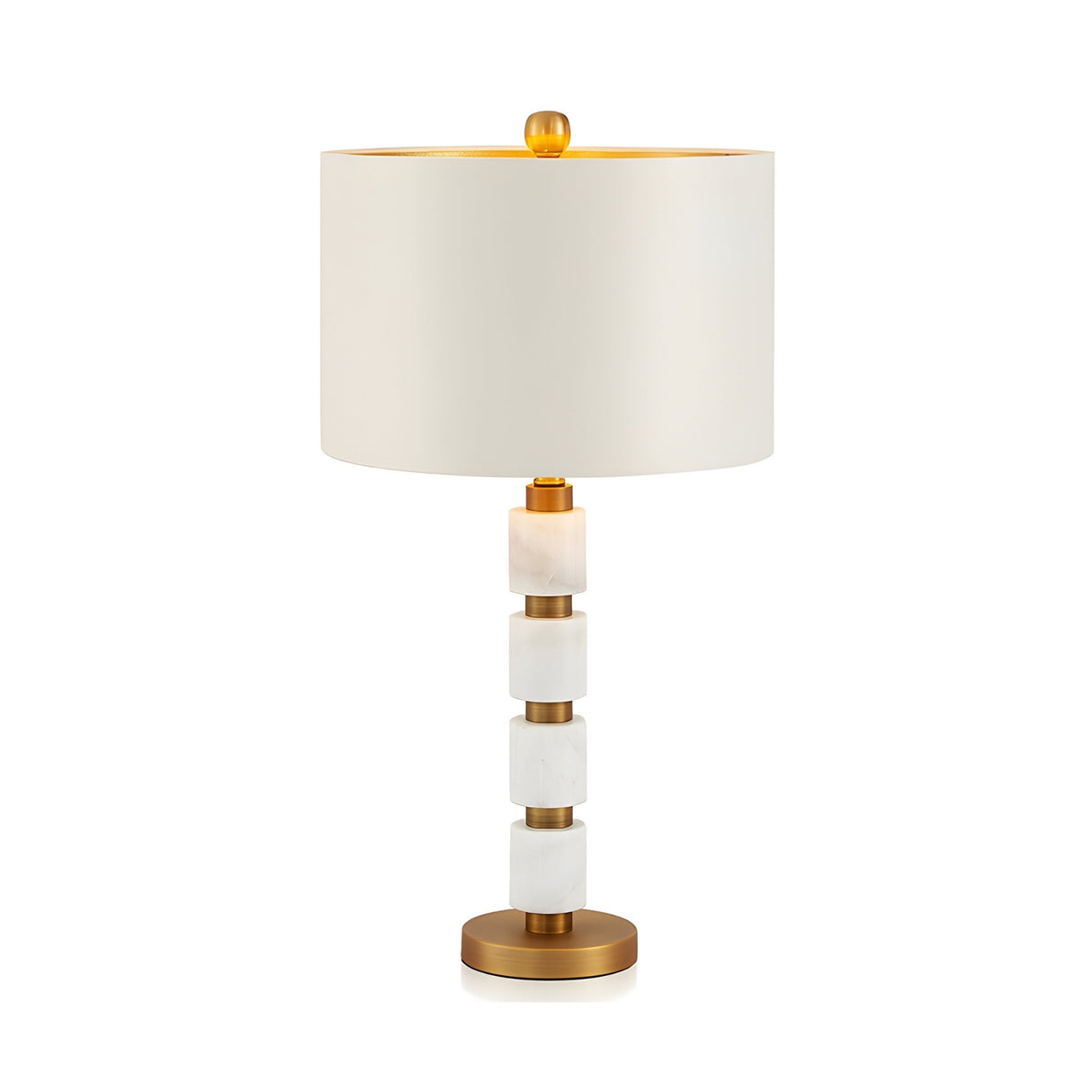 The Noirion 1 Light Stacked Marble Table Lamp in brass and white features a white drum shade, gold finial, and gold-accented base, offering a modern, elegant touch for those who love contemporary architectural lighting.