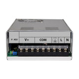 AVSL Mercury 13.8V 30A switch mode PSU shown front-on with V ADJ, V+, COM, earth, L and N screw terminals on a brushed metal casing.