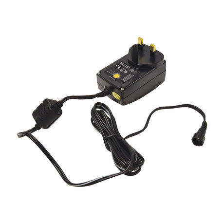 Mercury SMDC406UK 27W switch-mode power supply with UK three-pin plug, rotary voltage dial and coiled black DC output cable on a plain white background.