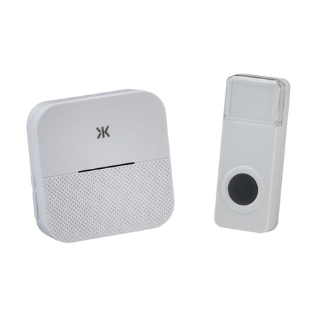 Introducing the Plug-In Wireless Doorbell - White, a set that includes a speaker and button. The plug-in receiver showcases a minimalist design with a small logo and perforations on the lower half. Enjoy hassle-free installation as the rectangular button features an easy-to-press large circular area. Both devices are crafted with modern and sleek aesthetics in mind.