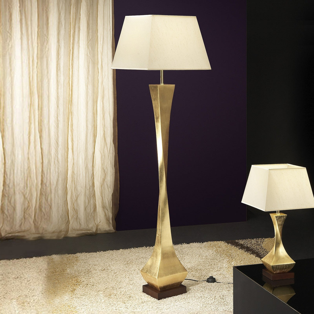 Deco Wood Floor Lamp shown lit in a living room