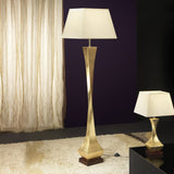 Deco Wood Floor Lamp shown lit in a living room