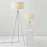 Endon Cranwell tripod floor lamp and matching table lamp in nickel with grey linen drum shades, shown against a plain light background.