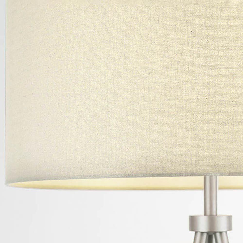 Close-up of the Endon Cranwell floor lamp showing the grey linen-effect drum shade and brushed nickel lampholder stem.