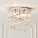 Vivienne 4 Light Flush Ceiling Light in polished chrome with cascading glass strands and crystal droplets, shown illuminated on a white ceiling.