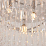 Vivienne 4 light flush ceiling light in polished chrome, close-up of glass rods and G9 bulbs around a chrome ring frame.