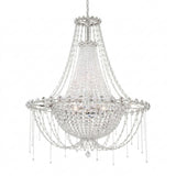 The Amara 8 Light K9 Crystal Chandelier in Chrome features multiple strands of sparkling K9 crystal in a tiered design, hanging from a chain with a rounded base and integrated lights.