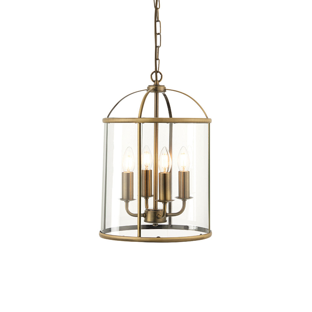 Caldbury 4 Light Pendant in brass with cylindrical clear glass panels, four candle-style bulbs, and a hanging chain, shown on a plain white background.
