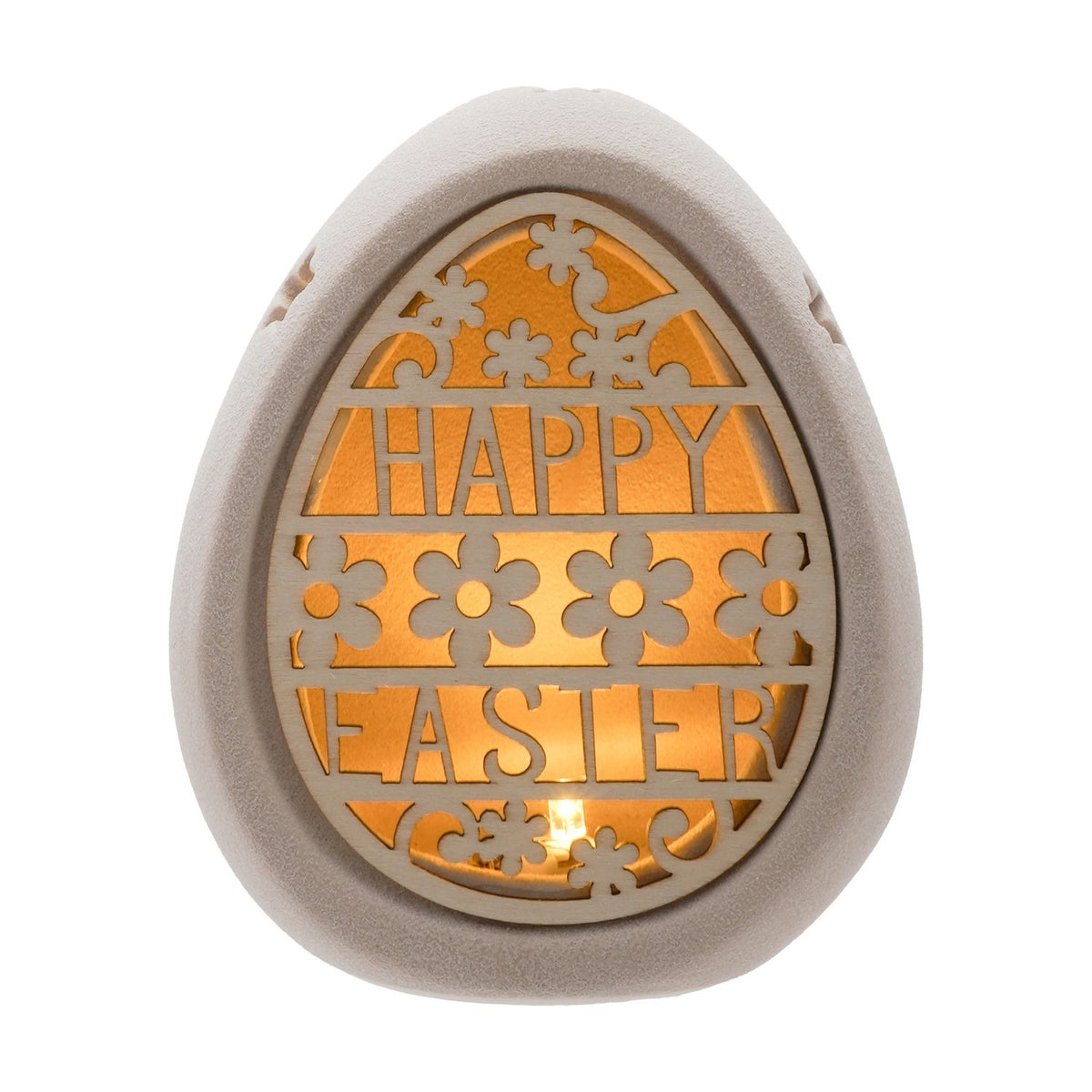 Ceramic egg-shaped light-up decoration in natural finish with a cut-out "HAPPY EASTER" design and floral details, glowing from within, on a plain white background.