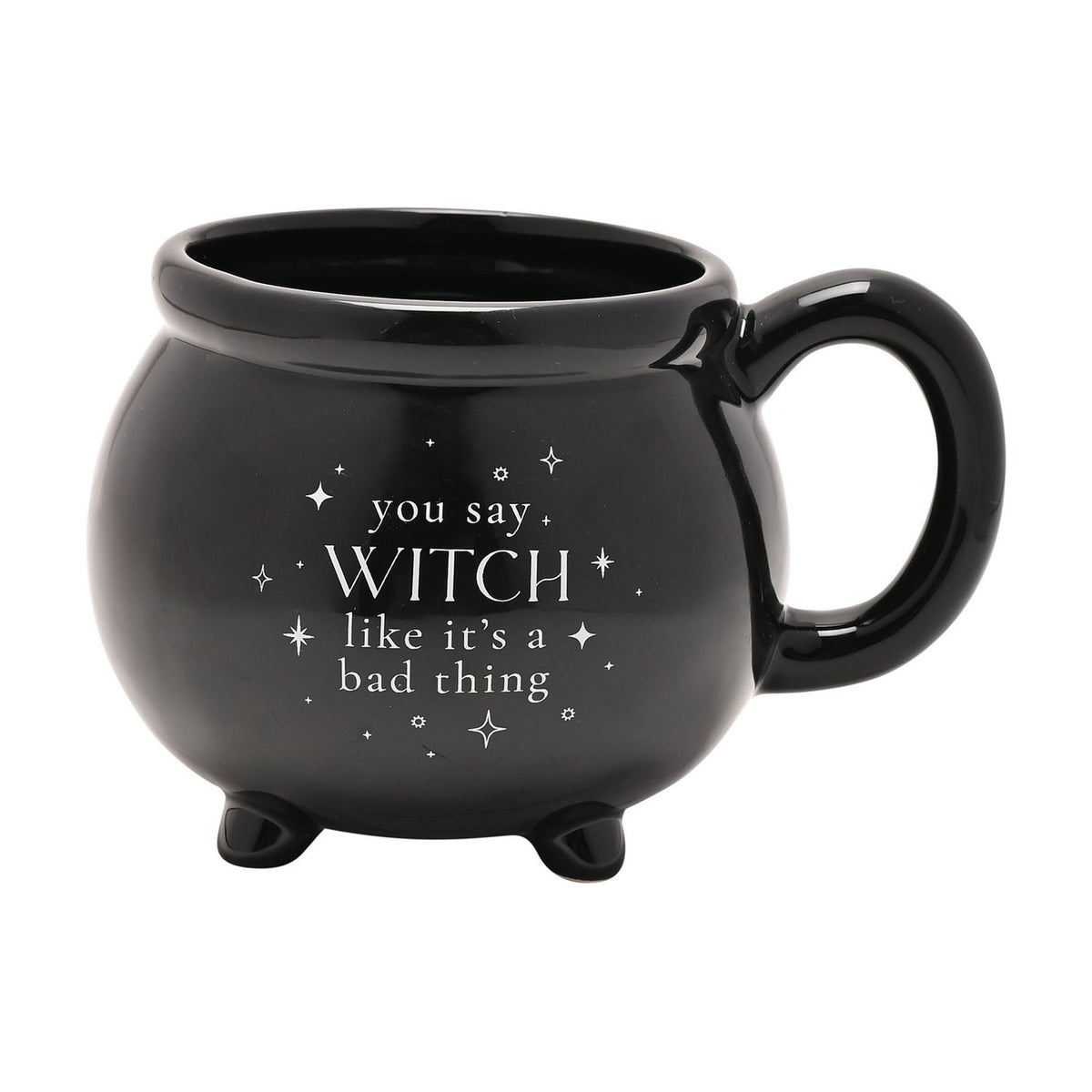 Black ceramic cauldron mug with stubby feet and loop handle, glossy finish with white "you say WITCH like it's a bad thing" text and stars, on a plain white background.