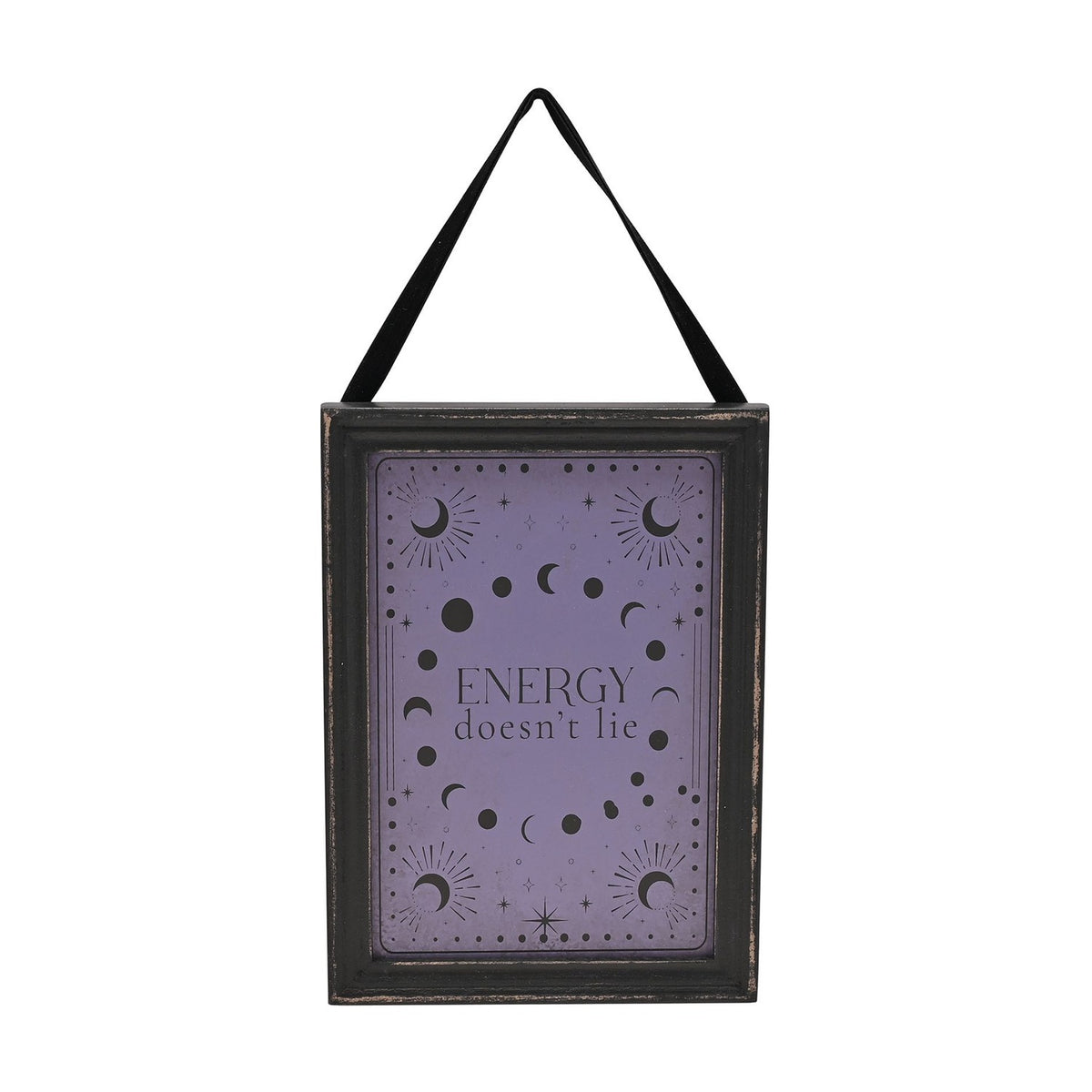 Wooden hanging wall plaque with black frame and black ribbon, featuring a purple face with moon phases, crescent moons, stars, and the text "Energy doesn't lie," shown on a white background.