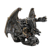 Silver resin wine and glass holder featuring a winged dragon with clawed limbs perched on a gothic skull with gear-filled eye sockets, shown on a white background.