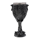 Resin goblet with stainless steel rim, featuring a skull and bat motif, Celtic knotwork, a twisted branch stem, and small bats on the round base.